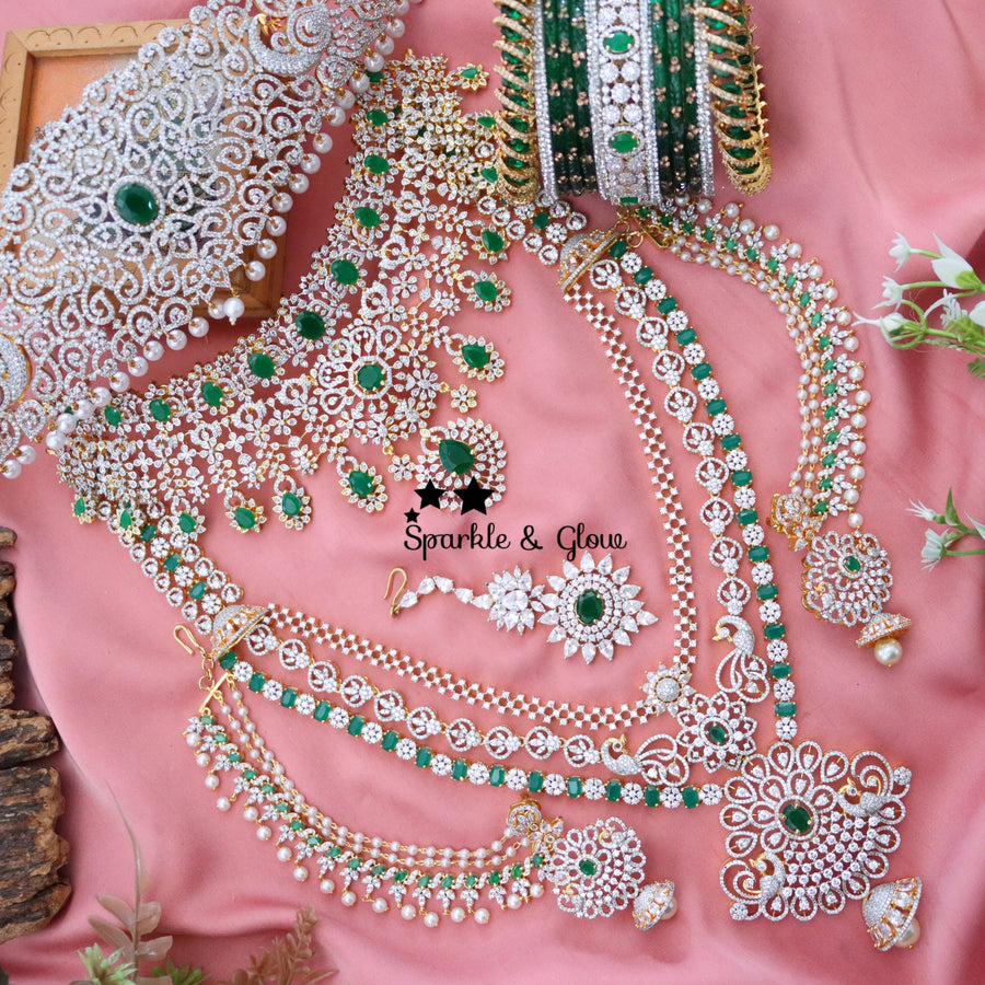 "Why spend lakhs when you can sparkle like a queen? 💎✨ This American Diamond Bridal Set is pure bridal luxury without the hefty price tag! 👰✨"
Wedding Season Sale Get 15% discount on sitewide
Get Free Gift Above 10k
Get Free Shipping above 7.5k &30k(Domestic&
International)
Get 7% discount on First Order
1 ID L-12407,C-19425,EC-30801,H-16085,M-23908
2.ID L-29831,C-2010,EC-20150,H-12928,M-23895
3. ID L-7902,C-19356,EC-30802,H-12936,M-23879
4. ID Set-12405,EC-27010,H-13380,M-9908
5.ID L-10089,C-26931,EC-  1