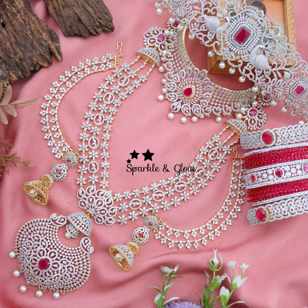 "Why spend lakhs when you can sparkle like a queen? 💎✨ This American Diamond Bridal Set is pure bridal luxury without the hefty price tag! 👰✨"
Wedding Season Sale Get 15% discount on sitewide
Get Free Gift Above 10k
Get Free Shipping above 7.5k &30k(Domestic&
International)
Get 7% discount on First Order
1 ID L-12407,C-19425,EC-30801,H-16085,M-23908
2.ID L-29831,C-2010,EC-20150,H-12928,M-23895
3. ID L-7902,C-19356,EC-30802,H-12936,M-23879
4. ID Set-12405,EC-27010,H-13380,M-9908
5.ID L-10089,C-26931,EC-  1
