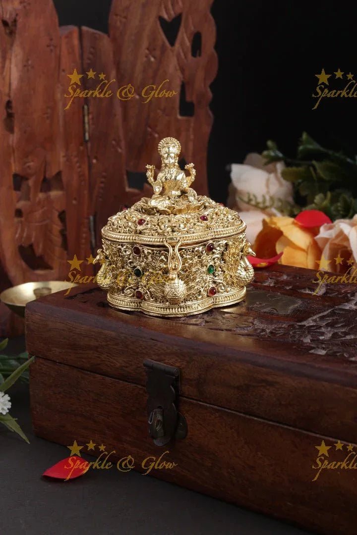 Gold alike Lakshmi peacock carved kumkum box - Sparkle and Glow