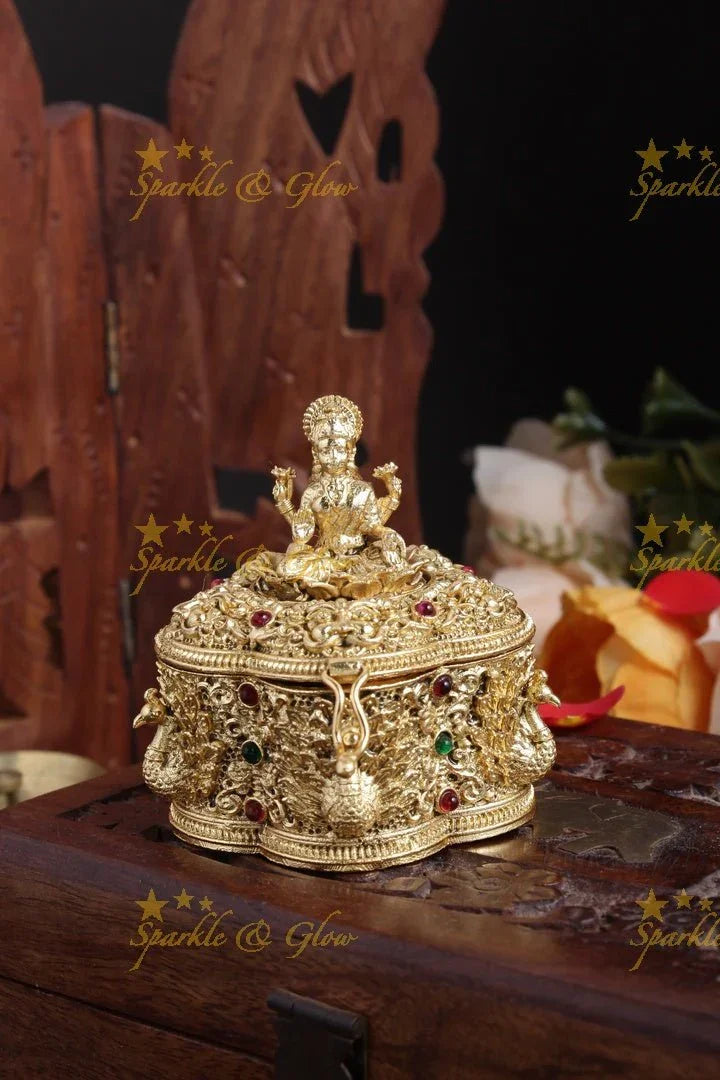 Gold alike Lakshmi peacock carved kumkum box - Sparkle and Glow