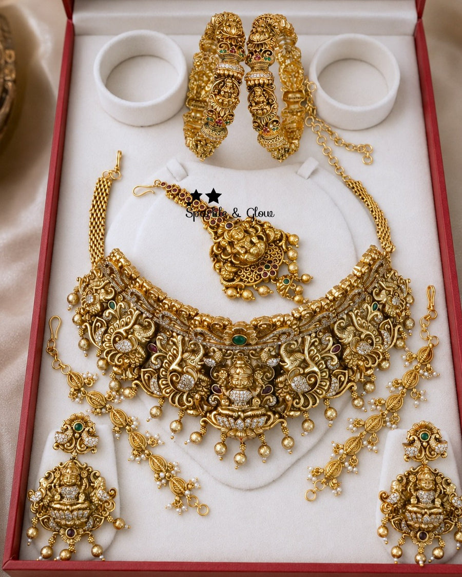 👑 "A touch of temple tradition, a whole lot of bridal elegance!"
Wedding Season Sale Get 15% discount on sitewide
Get Free Gift Above 10k
Get free Domestic shipping
above 2000/- and for international its discounted shipping
1. ID C-3669,EC-31697,B-20130,14320
2.ID C-7928,EC-31685,B-23506,M-15996
3.ID C-3082,EC-31687,B-2945,M-24490
4.ID C-26400,EC-19937,B-31740_2_6,14320,M-26402
5.ID C-26788,EC-31706,B-31738_2_4,M-26404
6.ID C-16175,EC-31705,B-2945,23506,M-16118
7.ID C-22698,EC-31706,B-24607,27439_2_4,M-120