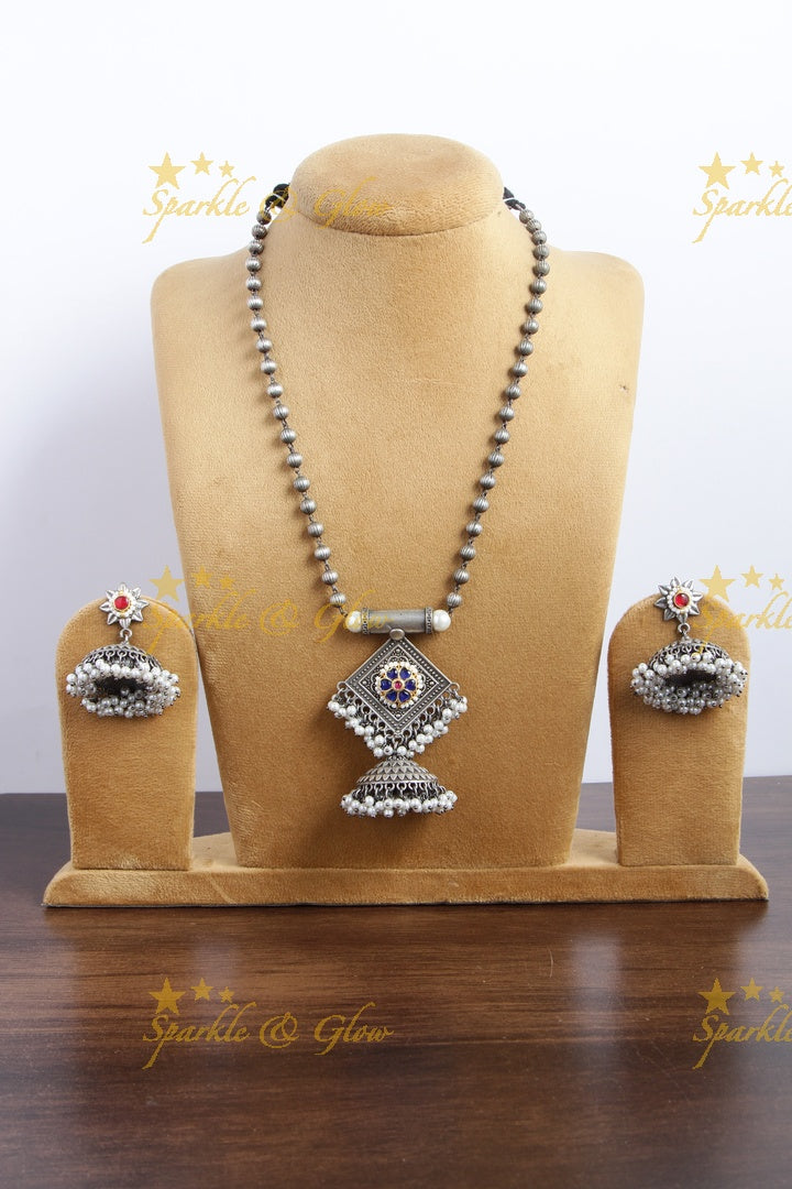 Silver look alike beads jhumuka pendent chain with blue jadau hibiscus