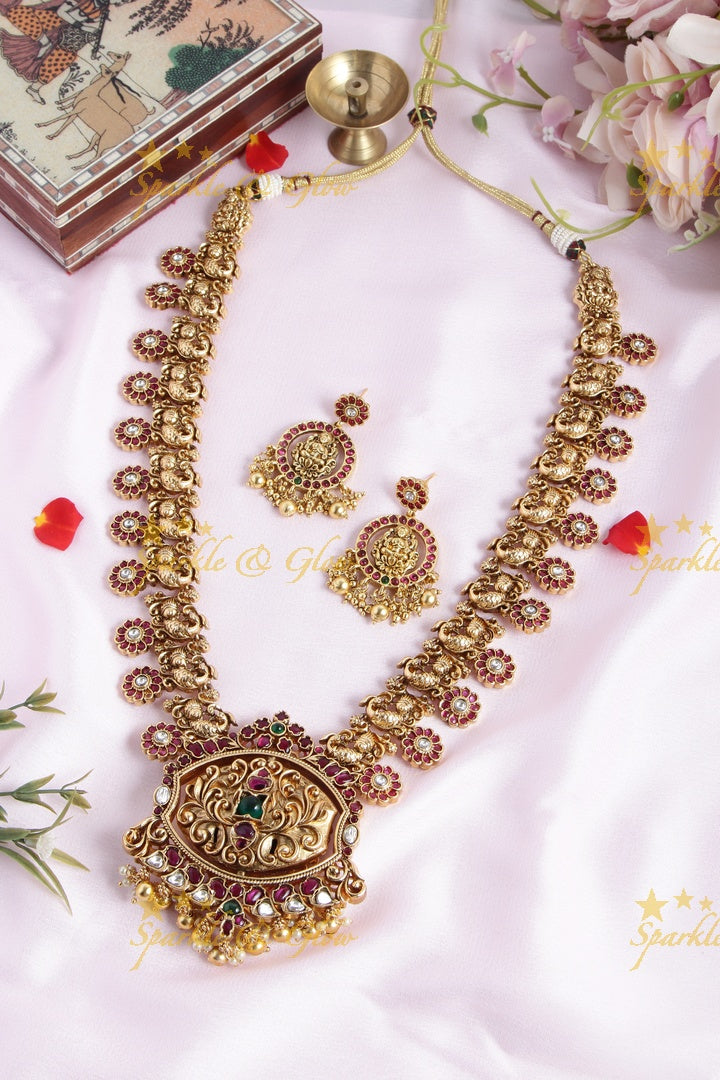 Gold alike floral bottu peacock haram with two sided pendent