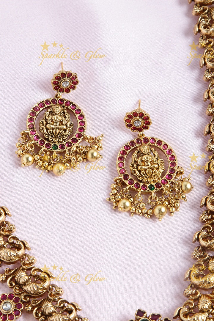 Gold alike floral bottu peacock haram with two sided pendent