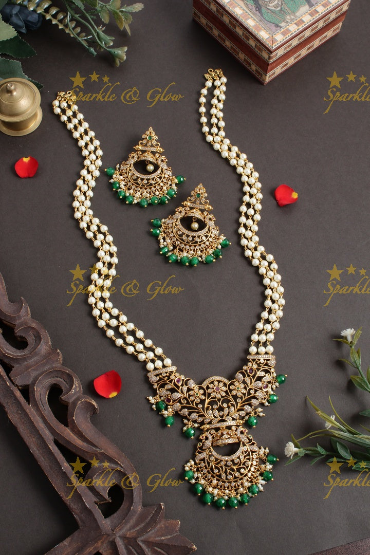 Statement  non idol pendent pearl chain set with green beads