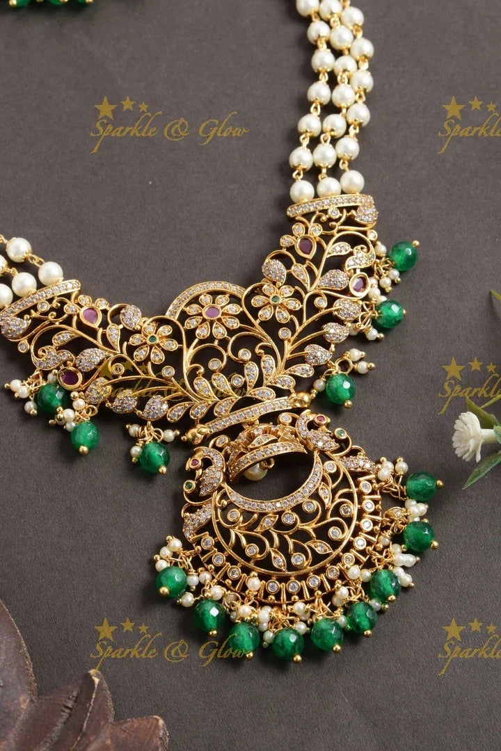 Statement non idol pendent pearl chain set with green beads - Sparkle and Glow