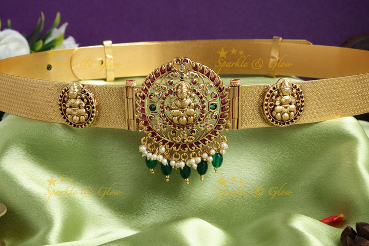 Gold alike Lakshmi pendent plain hipbelt with green beads