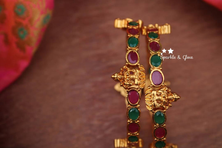 Matte finish peacock design cz stone bangles a pair
