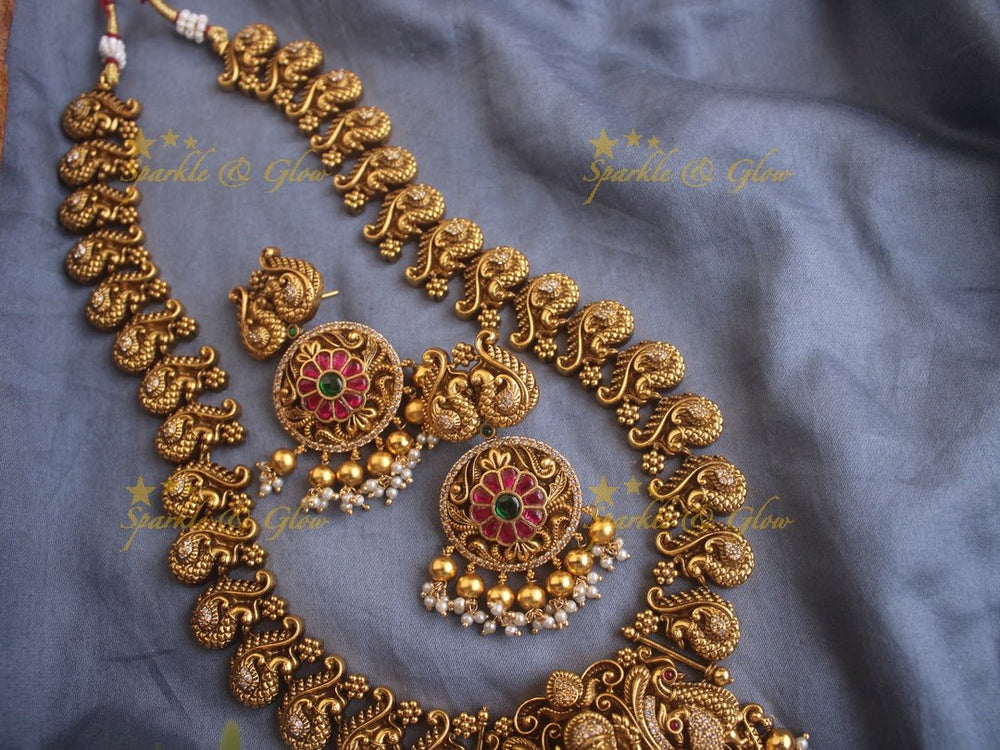 Elegant gold alike Jadau Lakshmi and peacock carved long necklace with green beads - Sparkle and Glow - Green - Back Thread
