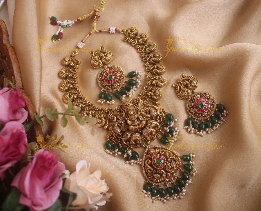 Elegant gold alike Jadau Lakshmi and peacock carved short necklace with gold beads - Sparkle and Glow - Green - Back Thread