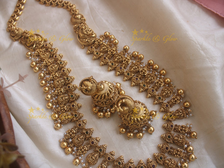 Beautiful gold alike Lakshmi and peacock carved long necklace with gold beads