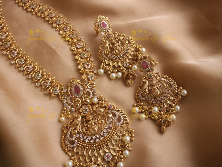 Stunning premium dull matte finish Lakshmi and peacock carved long necklace with stones and pearls