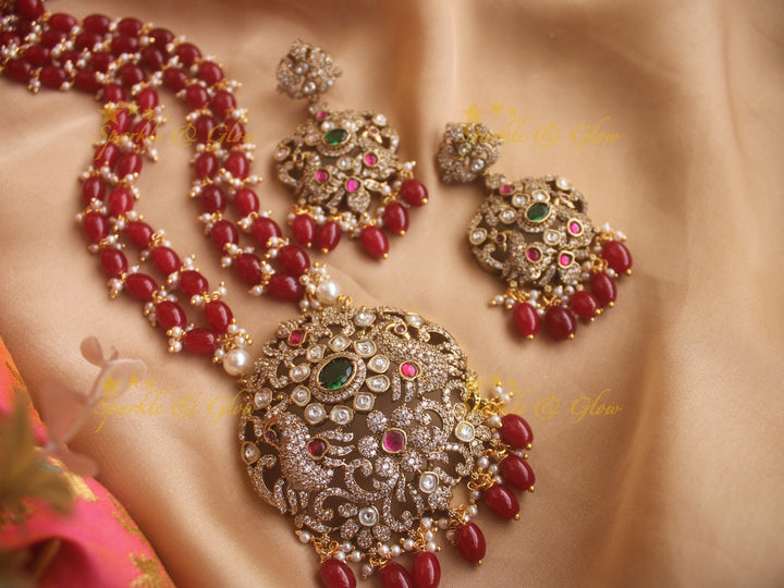 Gorgeous Peacock Victorian AD haram with ruby emarald and red beads