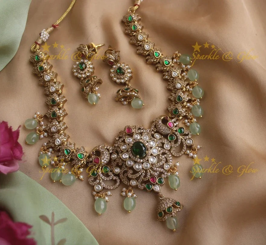 Gorgeous Peacock Victorian AD necklace with ruby and pastel green beads - Sparkle and Glow