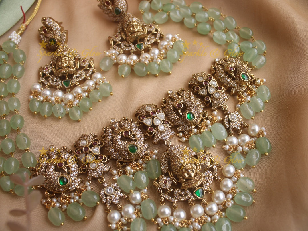 Exquisite Venkatesh peacock Victorian AD highneck choker with pastel green beads