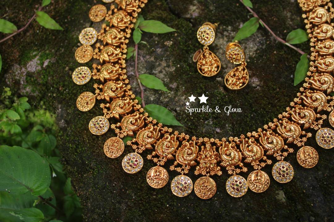 Gold alike polished peacock style lakshmi coin necklace with stones