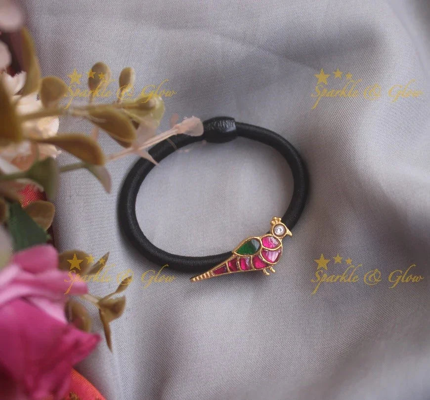Elegant bird red and green jadau hair band - Sparkle and Glow
