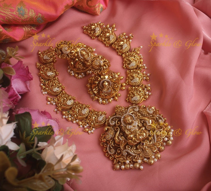 Exquisite gold alike Lakshmi and peacock carved short necklace with pearls and gold beads