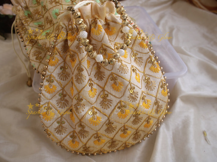 Embroidered 8.5*8 inch potli bags with gold beads