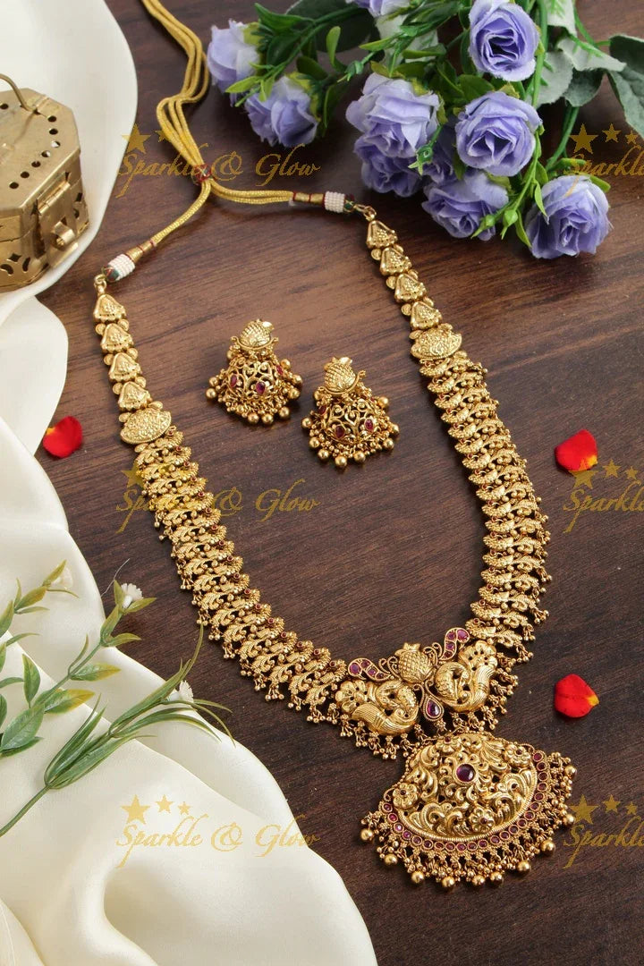 Grand intricate Peacock carved long necklace with ruby and mint green beads - Sparkle and Glow