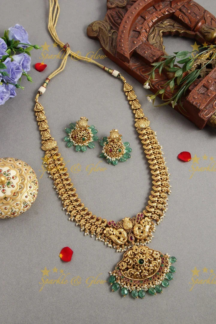 Grand intricate Peacock carved long necklace with ruby and mint green beads - Sparkle and Glow