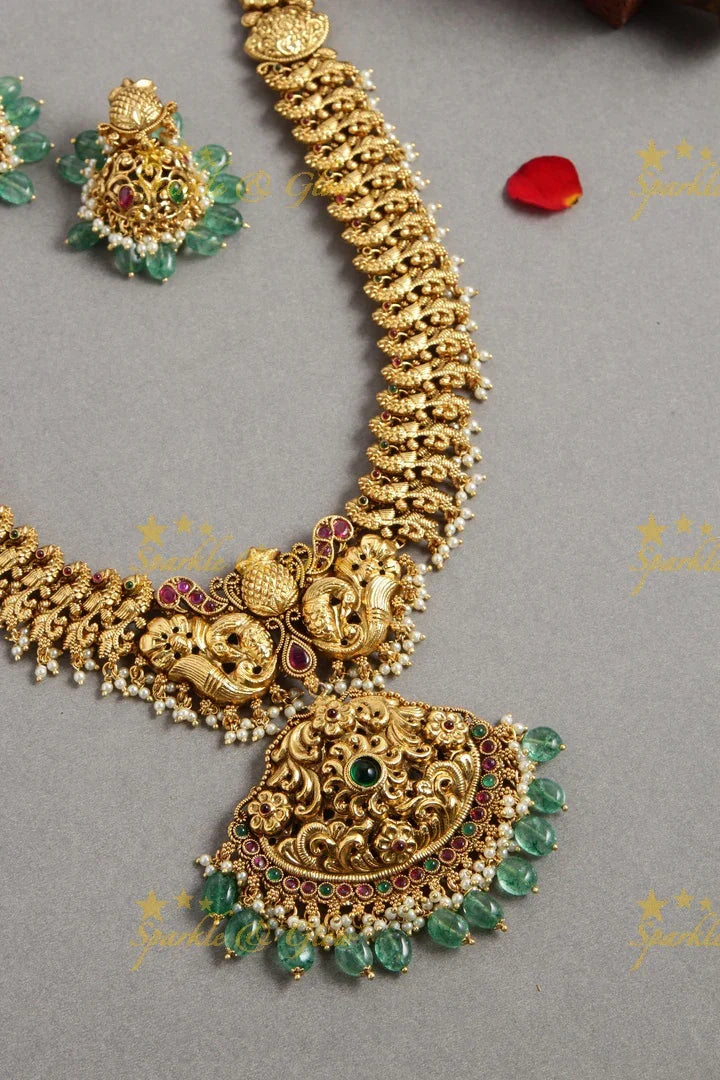 Grand intricate Peacock carved long necklace with ruby and mint green beads - Sparkle and Glow