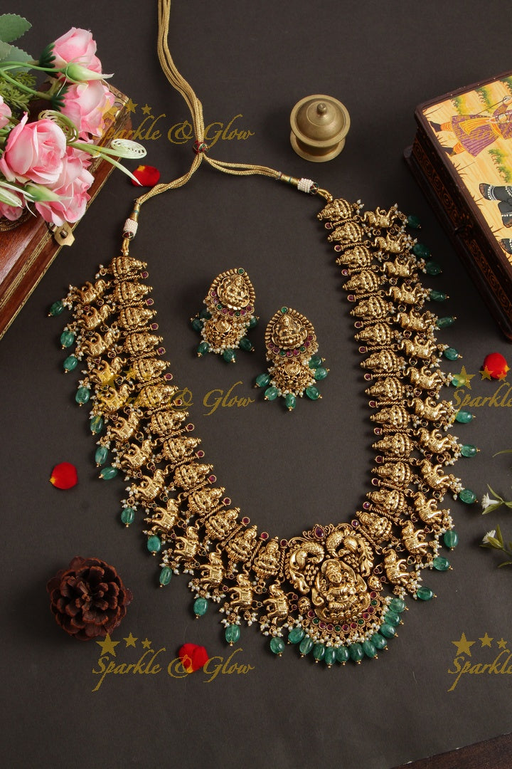 Gourgeous Lakshmi peacock elephant carved long necklace with ruby and green beads