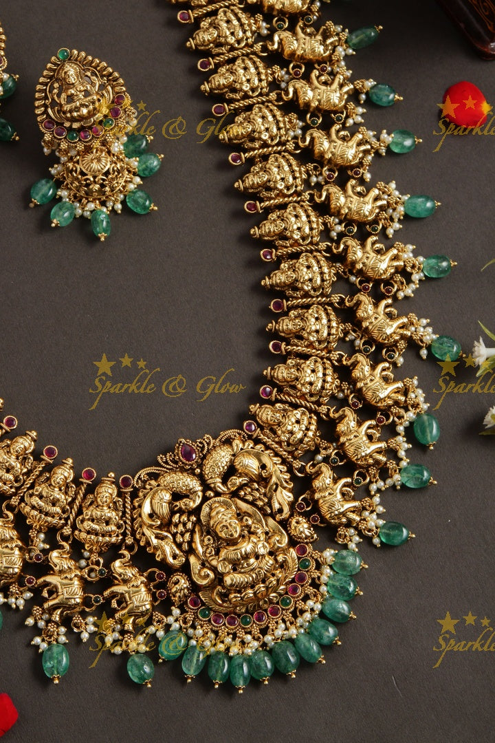 Gourgeous Lakshmi peacock elephant carved long necklace with ruby and green beads