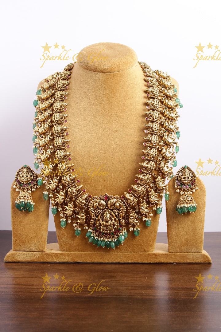 Gourgeous Lakshmi peacock elephant carved long necklace with ruby and green beads