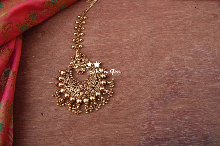 Gold alike polished chandbali style maang tikka