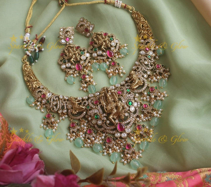 Exquisite Lakshmi Narasimha Victorian AD multi colour stone necklace with pearls and mint green beads