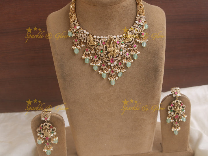 Exquisite Lakshmi Narasimha Victorian AD multi colour stone necklace with pearls and mint green beads