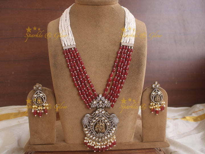 Statement Radha krishna pendent Victorian AD haram with multi layer red beads and pearl chain - red