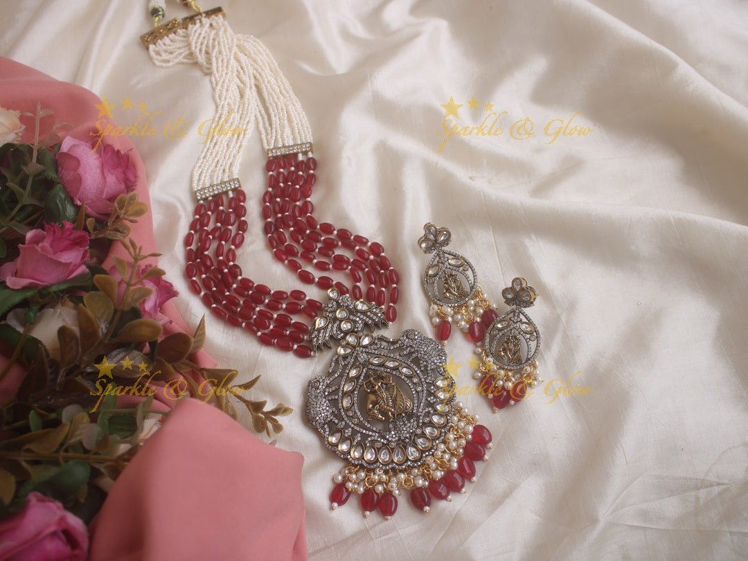 Statement Radha krishna pendent Victorian AD haram with multi layer red beads and pearl chain - red