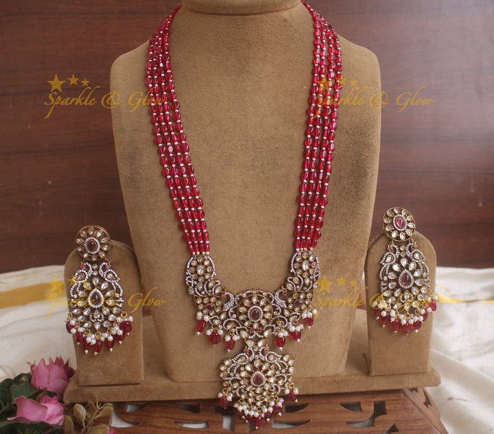 Exquisite grand Peacock pendent Victorian AD haram with multi layer red beads chain - red
