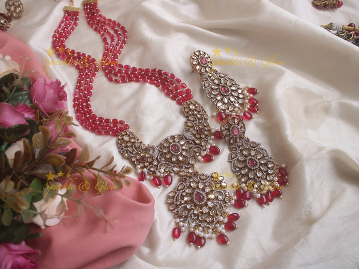 Exquisite grand Peacock pendent Victorian AD haram with multi layer red beads chain - red