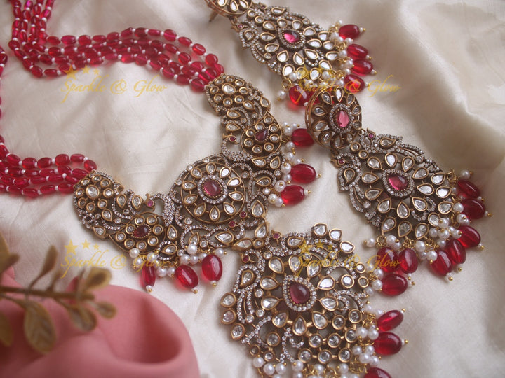 Exquisite grand Peacock pendent Victorian AD haram with multi layer red beads chain - red
