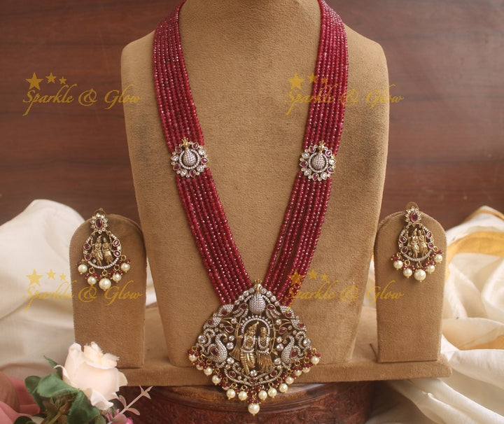 Statement Radha Krishna pendent Victorian AD haram with multi layer red beads chain - red