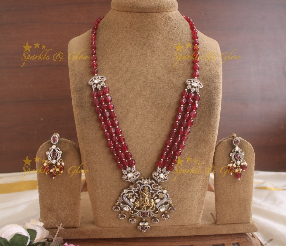 Exquisite Krishna playing flute pendent Victorian AD haram with multi layer red beads chain - red