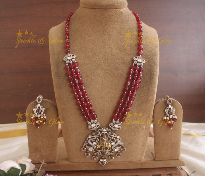 Exquisite Krishna playing flute pendent Victorian AD haram with multi layer red beads chain - red
