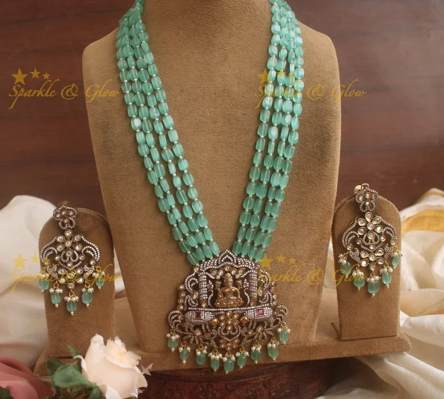 Exquisite Lakshmi carved pendent Victorian AD haram with multi layer beads chain - sea blue - Sparkle and Glow