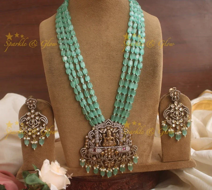 Exquisite Lakshmi carved pendent Victorian AD haram with multi layer beads chain - sea blue - Sparkle and Glow