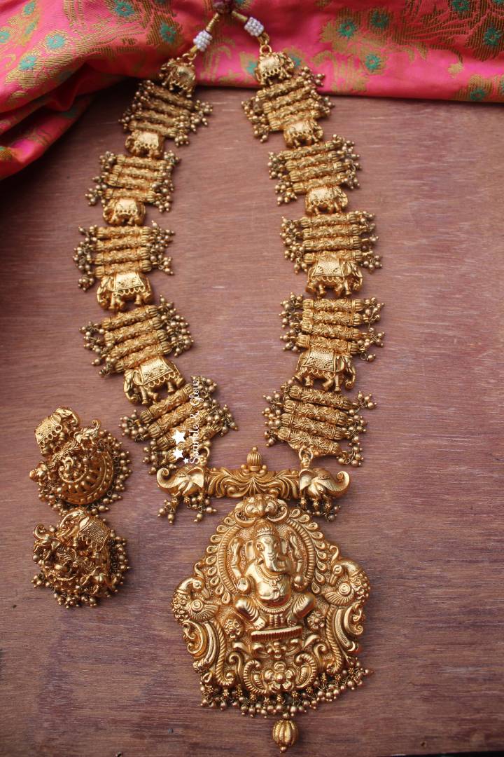 Gold alike Ganesh pendent with unique intricate design haram