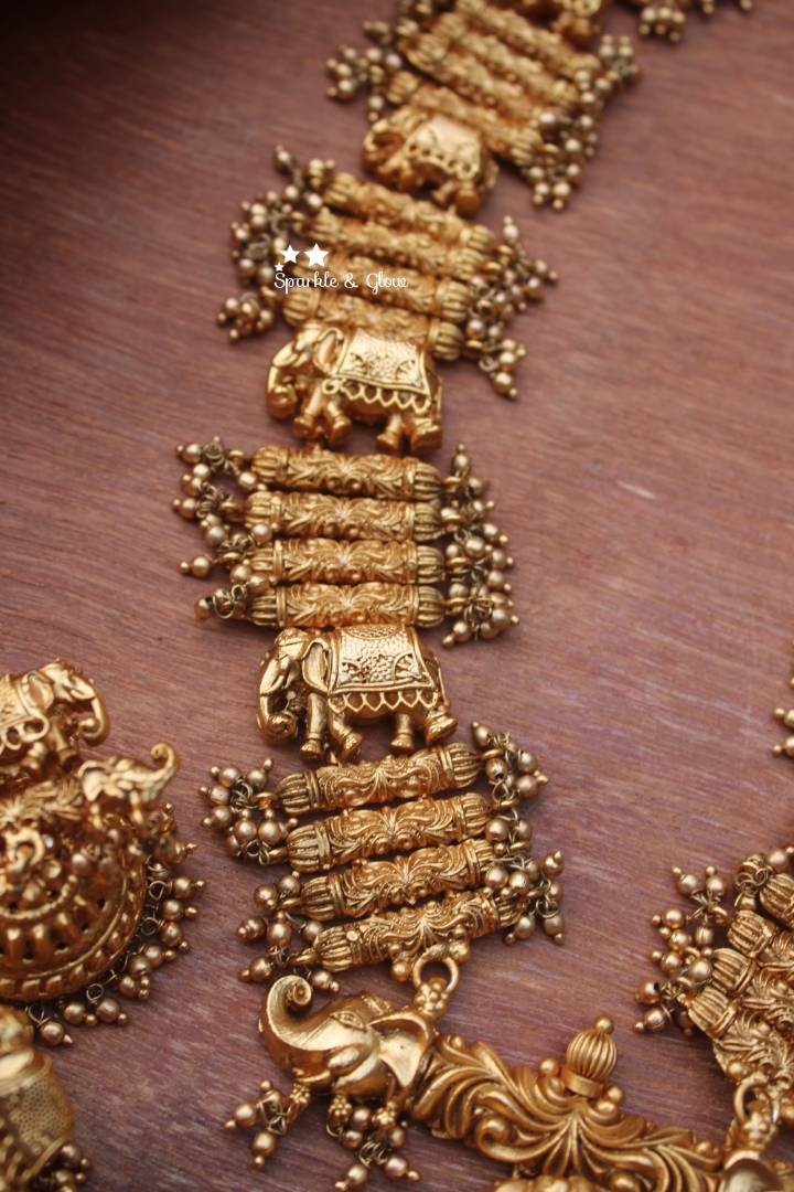Gold alike Ganesh pendent with unique intricate design haram