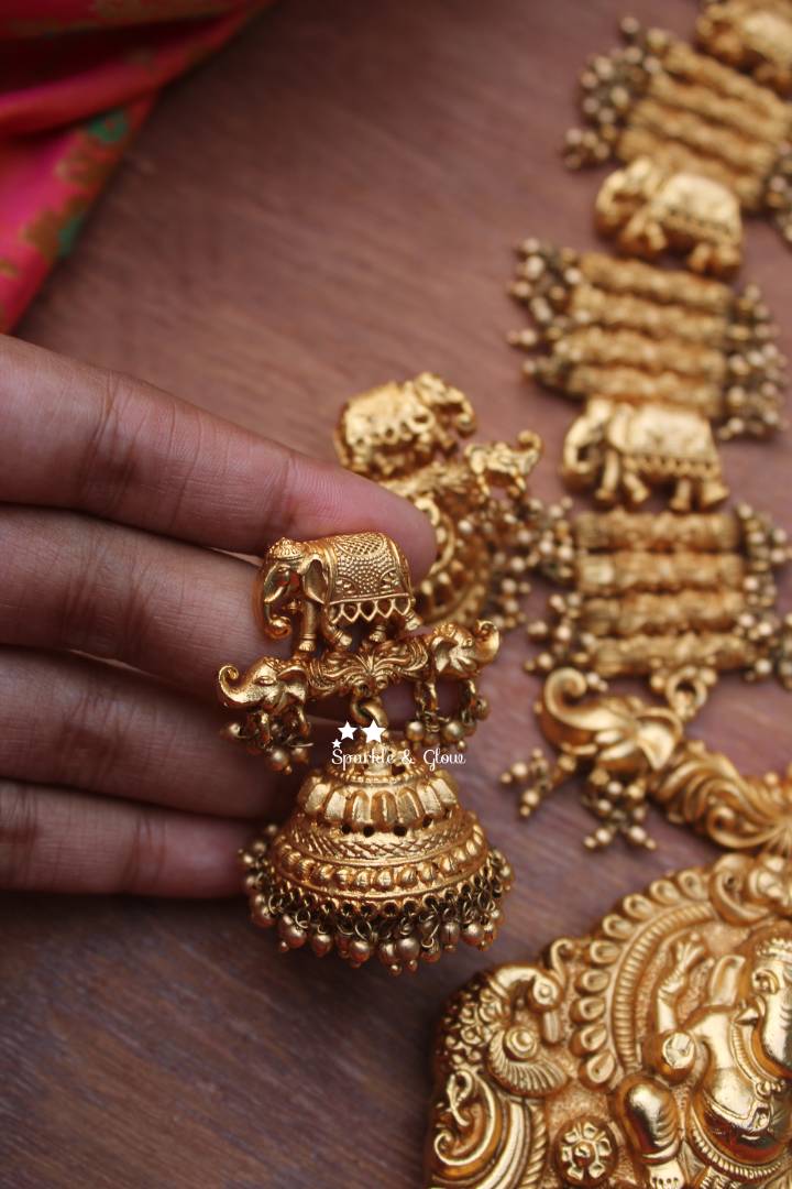 Gold alike Ganesh pendent with unique intricate design haram