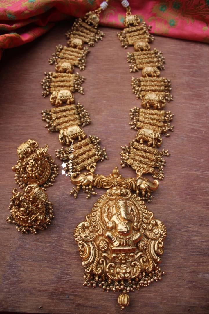 Gold alike Ganesh pendent with unique intricate design haram
