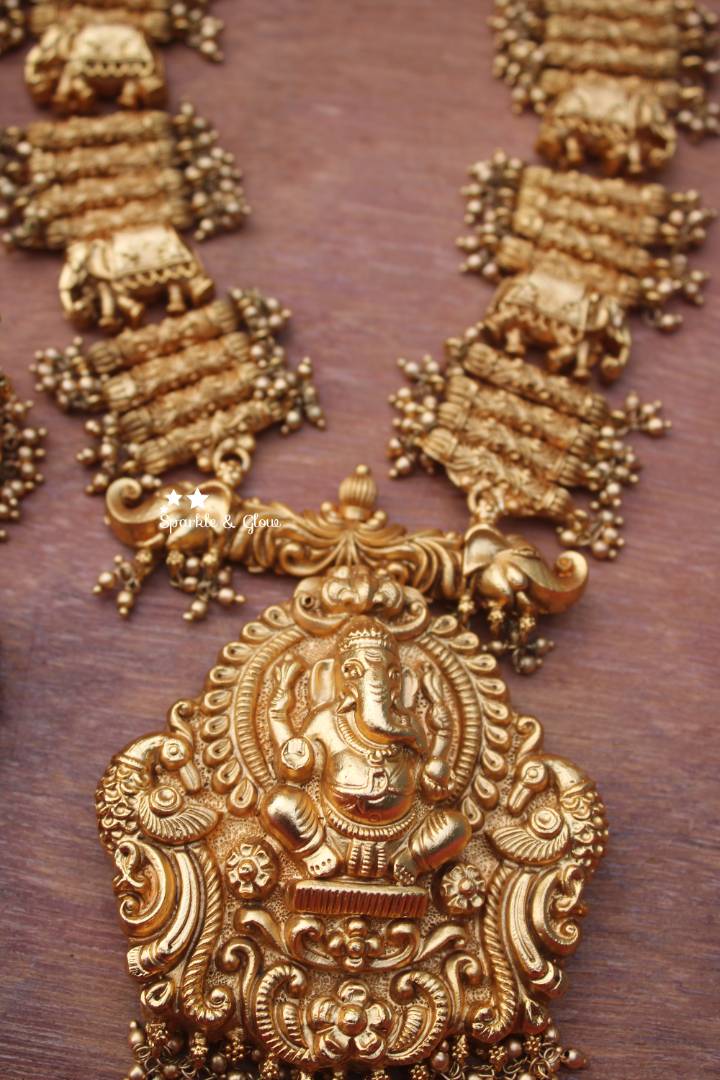 Gold alike Ganesh pendent with unique intricate design haram