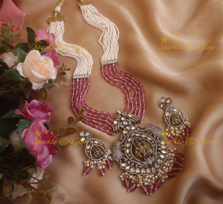 Statement Radha krishna pendent Victorian AD haram with multi layer red beads and pearl chain - red