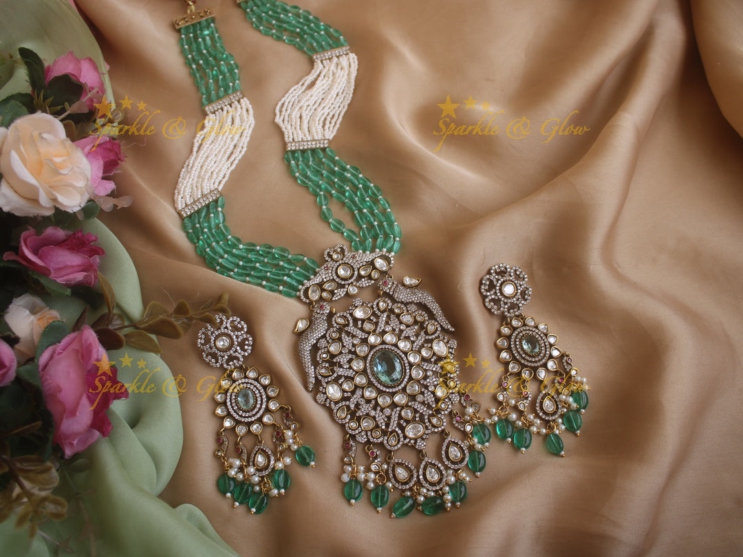 Grand floral pendent Victorian AD haram with multi layer green beads and pearl chain