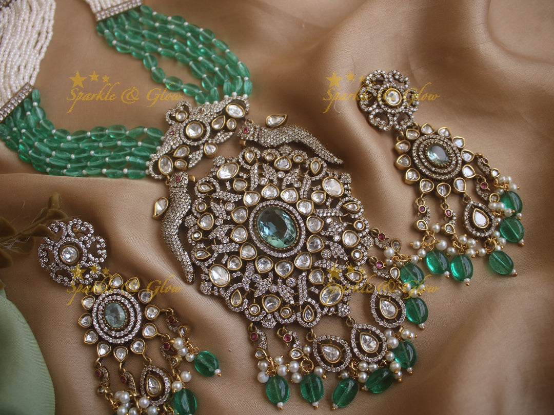 Grand floral pendent Victorian AD haram with multi layer green beads and pearl chain
